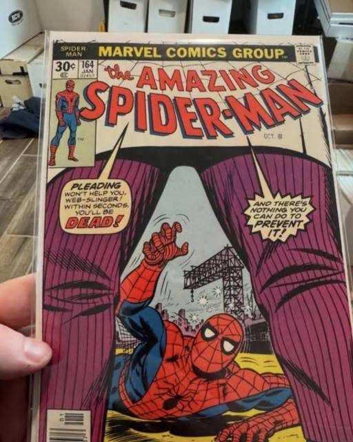 Raw Bronze Age Amazing Spider-Man #164 in front of long boxes of comics at Samurai Comix